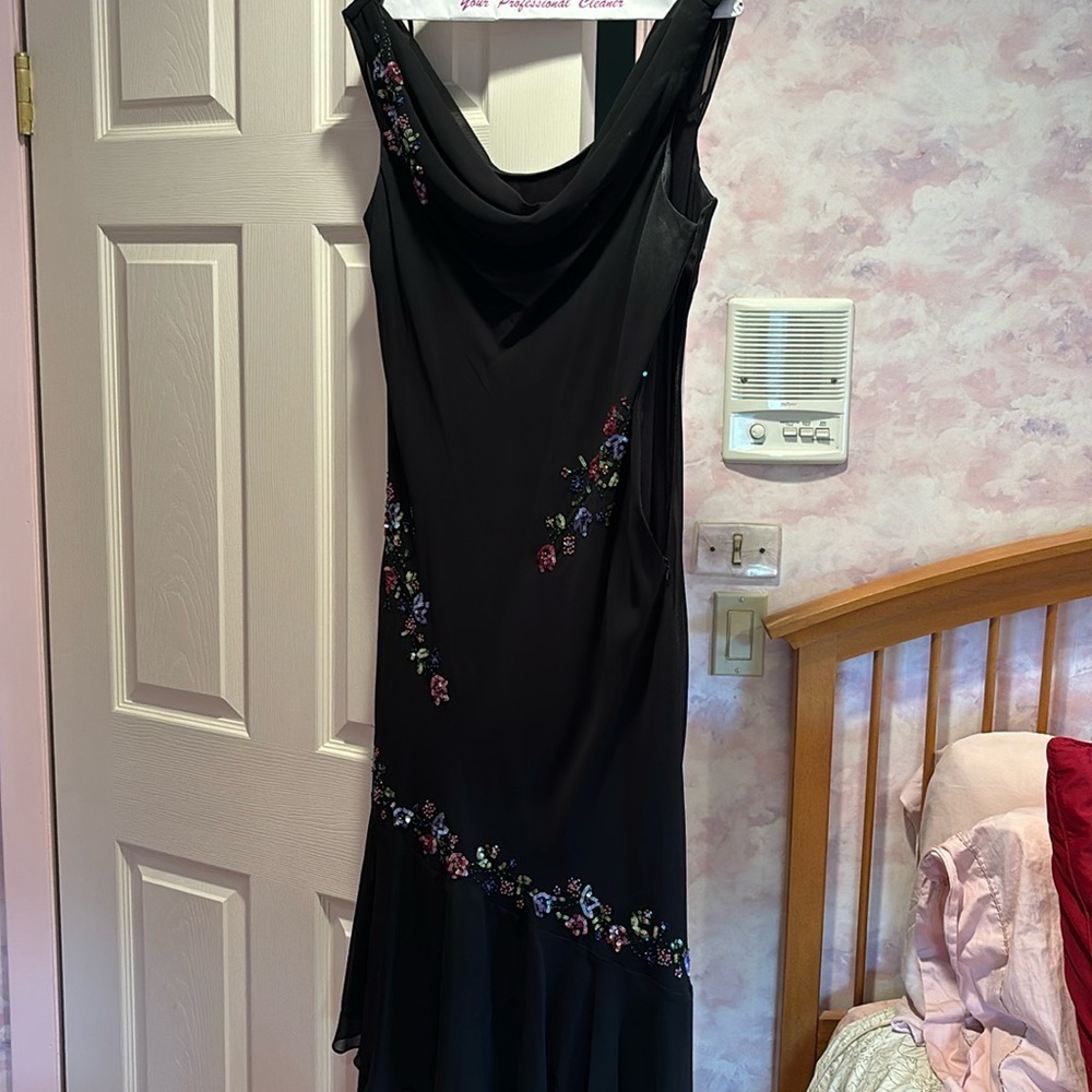 Woman’s black beaded dress